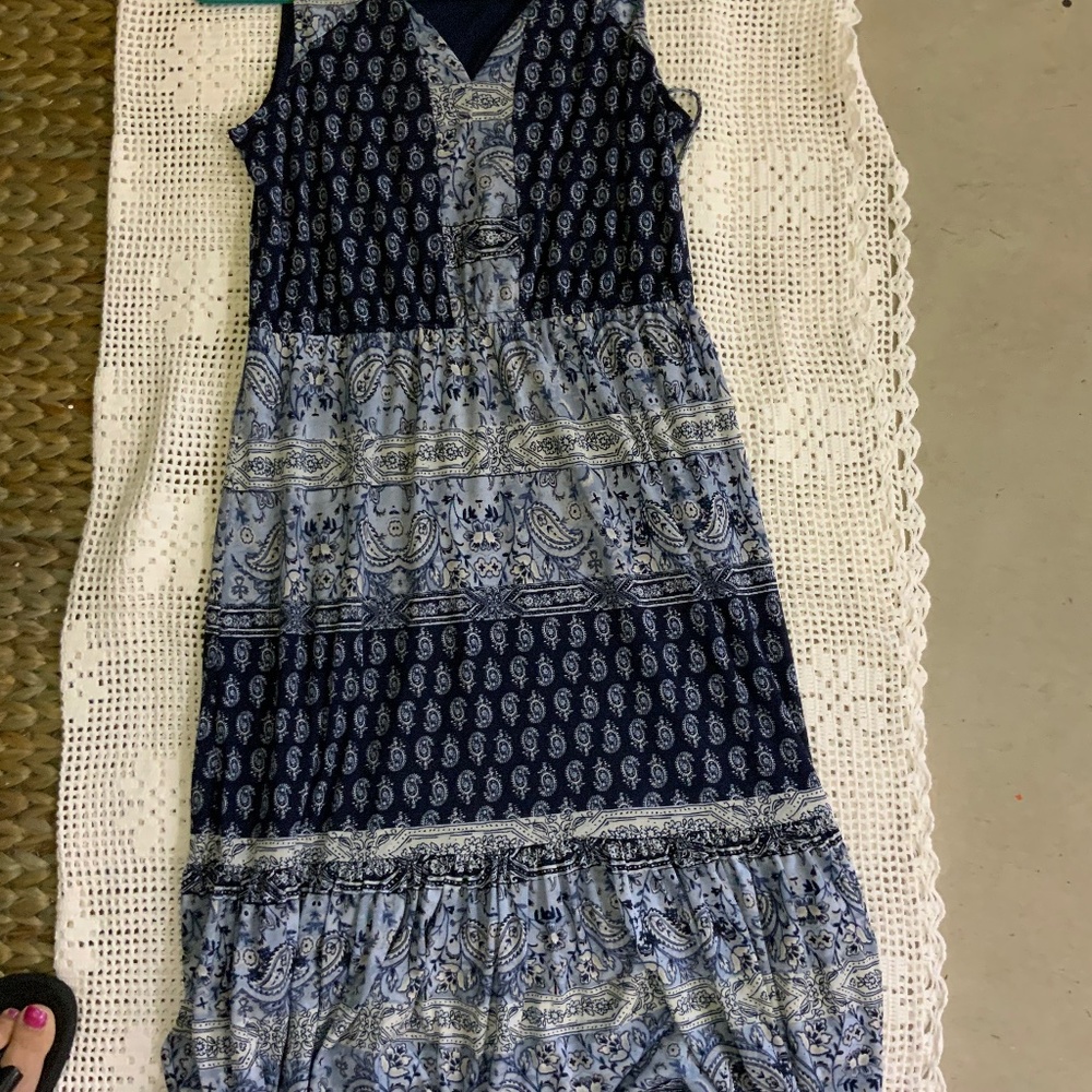 Sleeveless tiered dress.